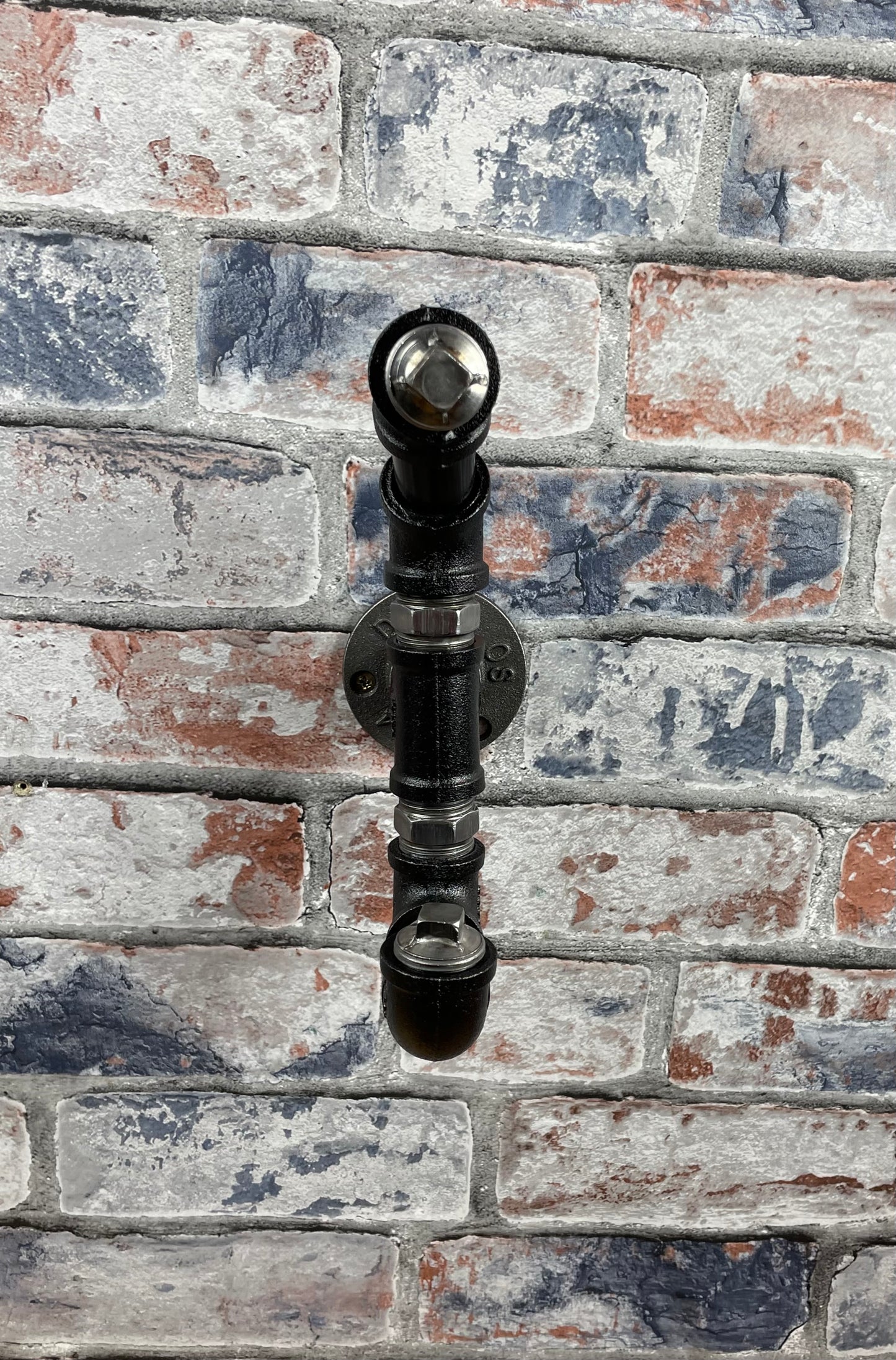 Industrial Style Metal Pipework Coat Hooks.
Chunky and super sturdy, these metal coat hooks come fully built and ready to attach to your wall.