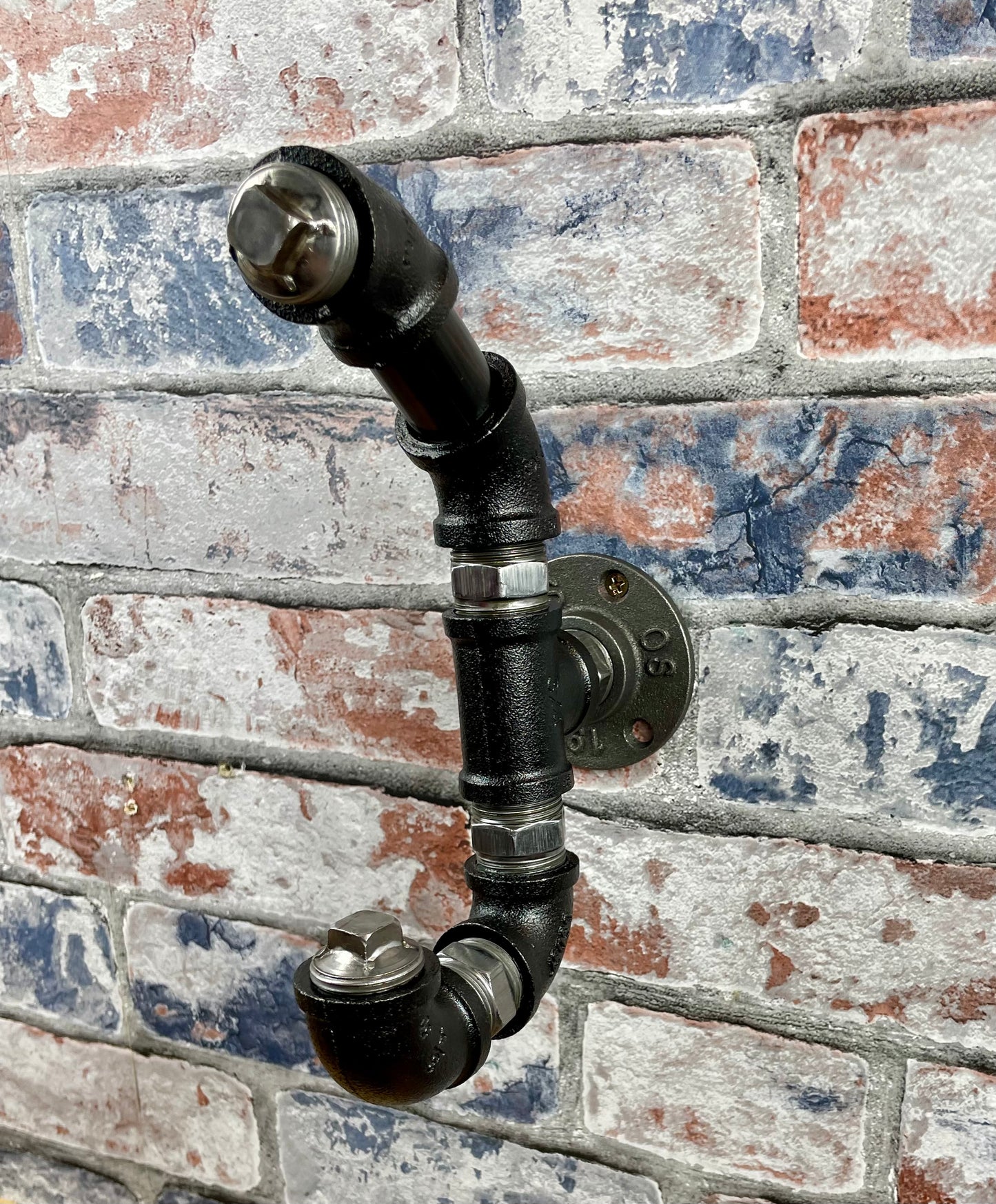 Industrial Style Metal Pipework Coat Hooks.
Chunky and super sturdy, these metal coat hooks come fully built and ready to attach to your wall.