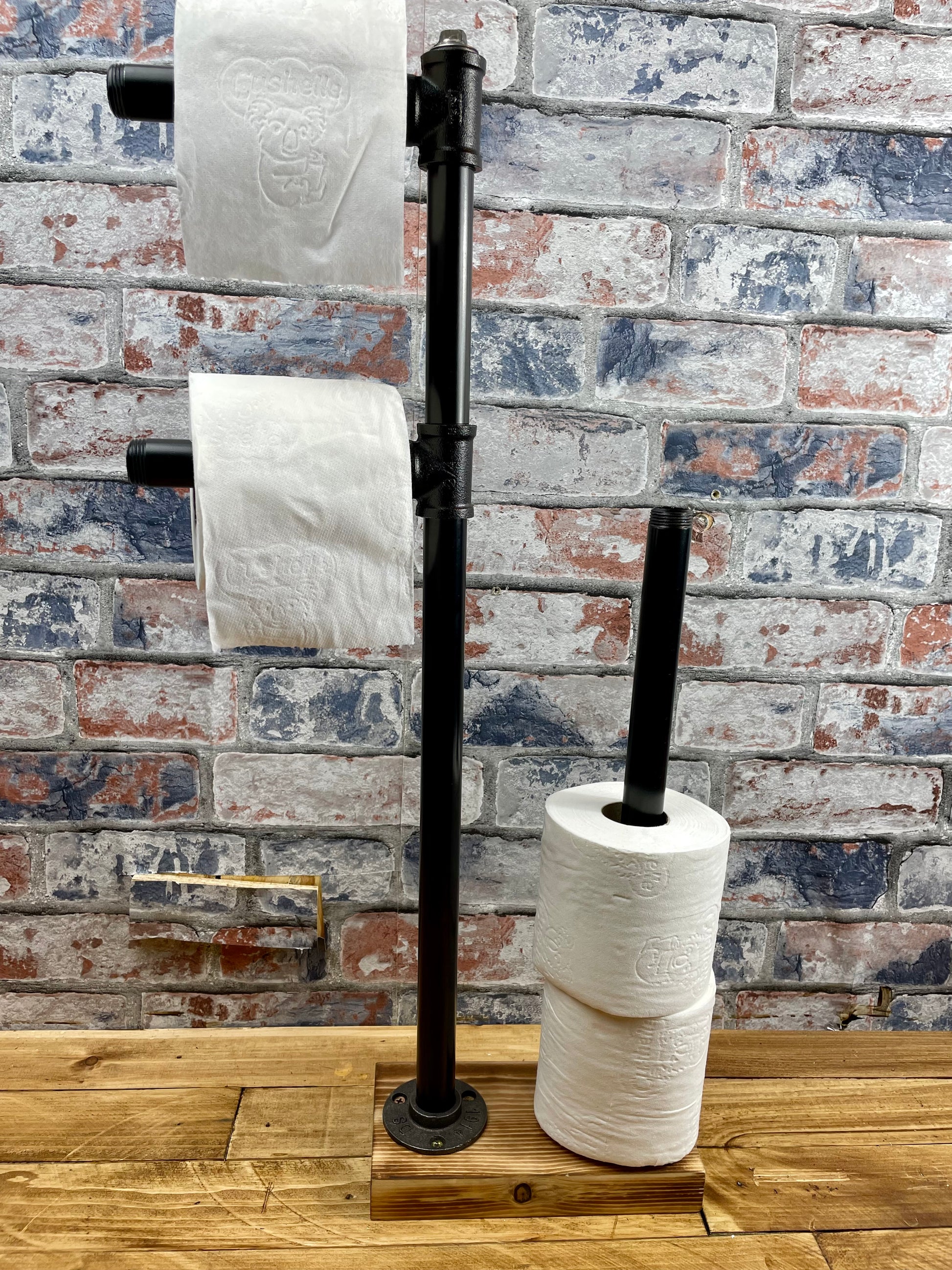 Industrial Style Pipework Free Standing Double Toilet Roll Holder &amp; Store.

Made to order industrial style pipework toilet roll holder with solid wood base in a choice of colours.