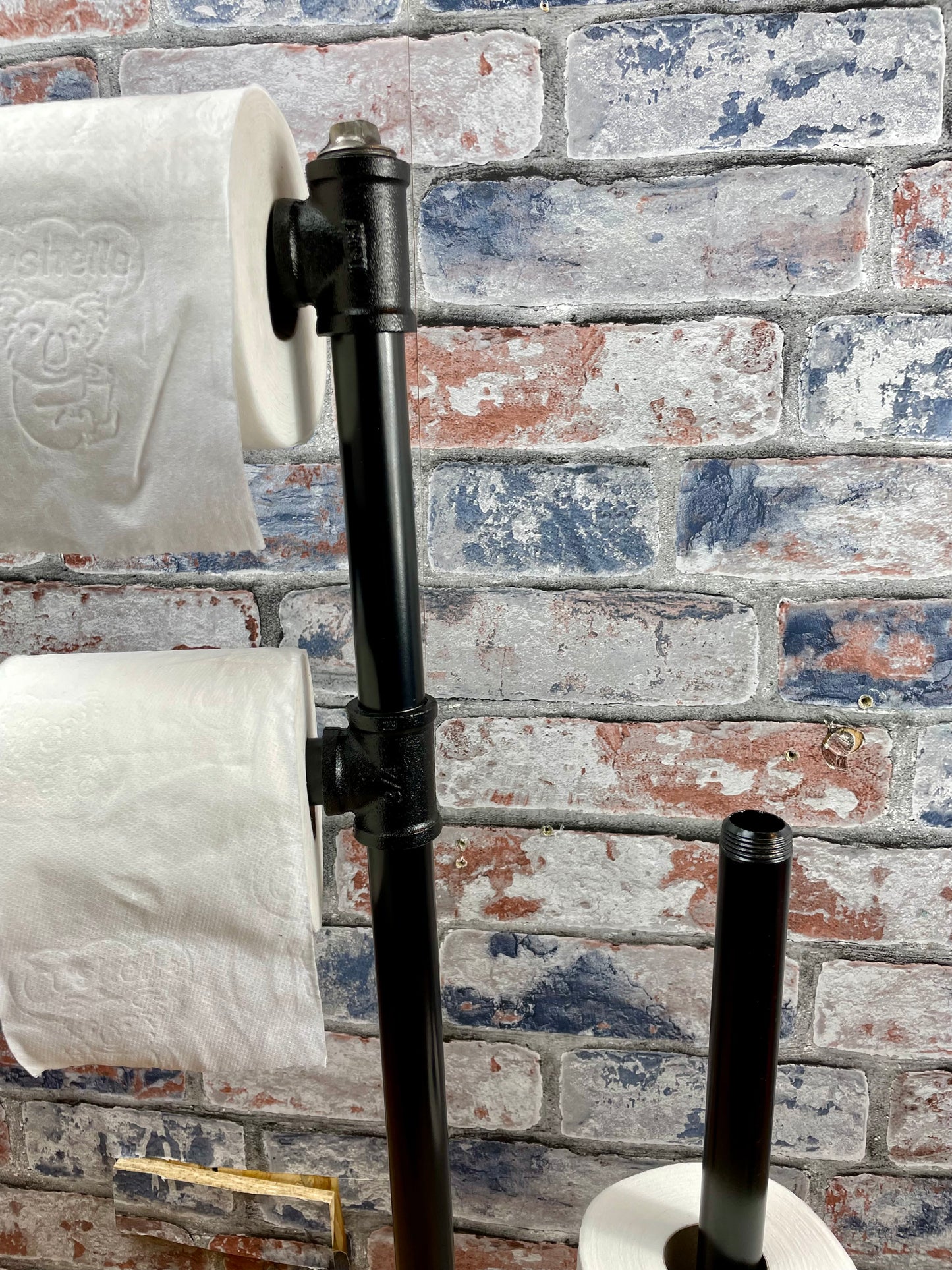 Industrial Style Pipework Free Standing Double Toilet Roll Holder &amp; Store.

Made to order industrial style pipework toilet roll holder with solid wood base in a choice of colours.