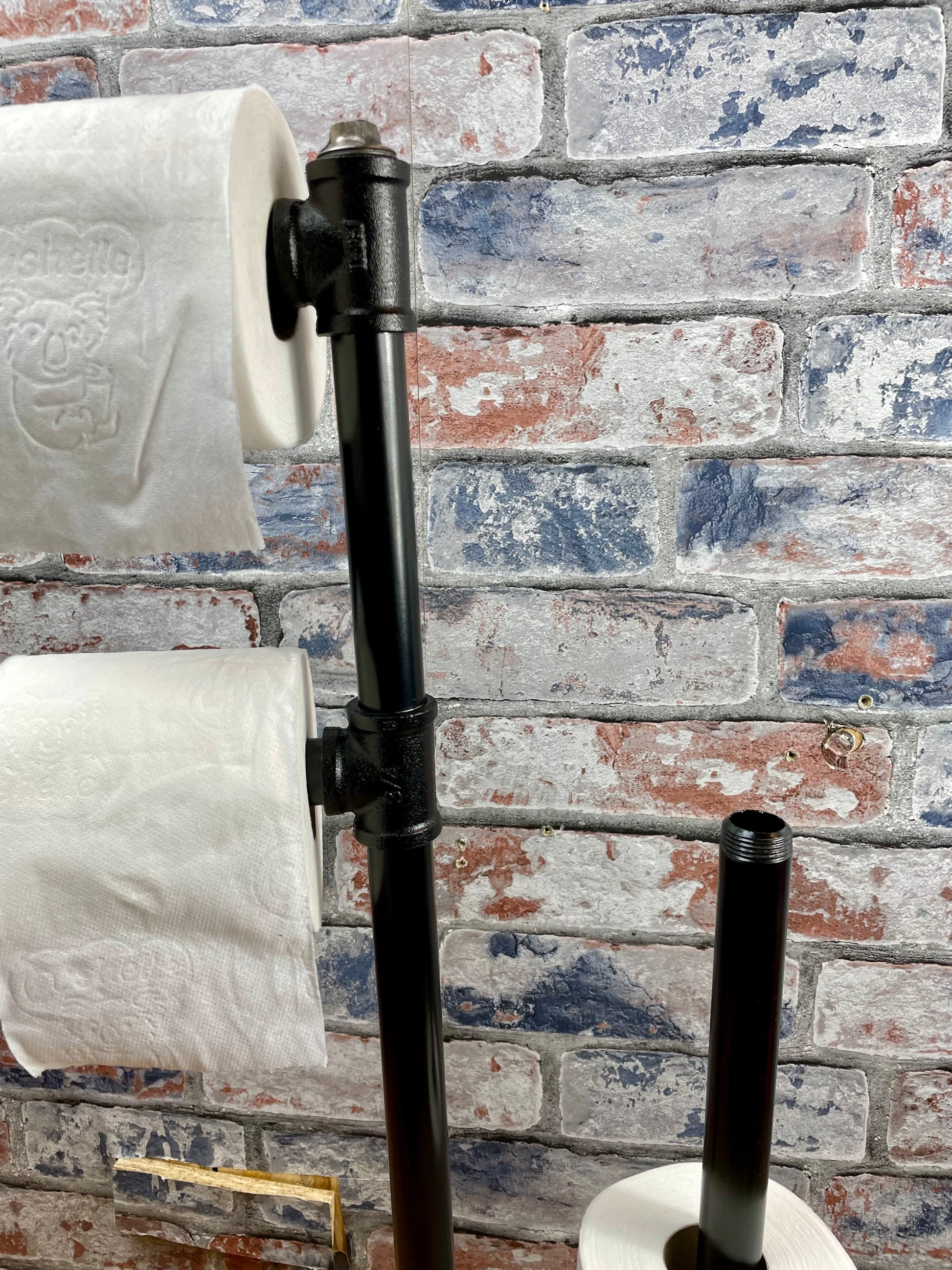 Industrial Style Pipework Free Standing Double Toilet Roll Holder &amp; Store.

Made to order industrial style pipework toilet roll holder with solid wood base in a choice of colours.