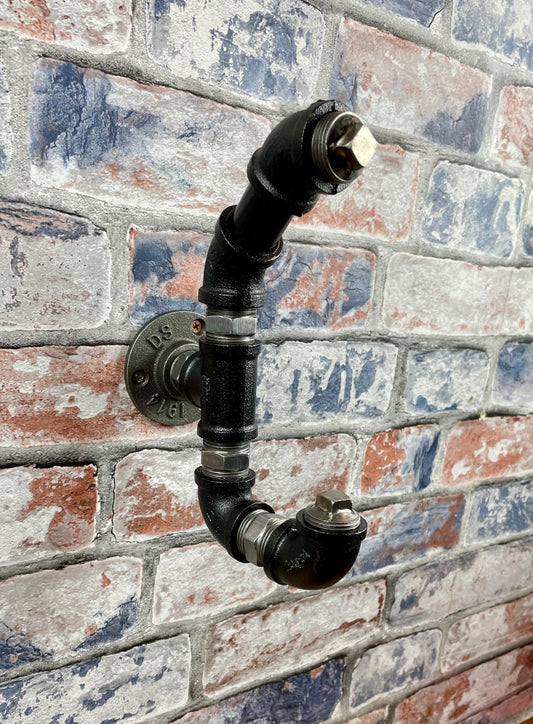 Industrial Style Metal Pipework Coat Hooks.

Chunky and super sturdy, these metal coat hooks come fully built and ready to attach to your wall.