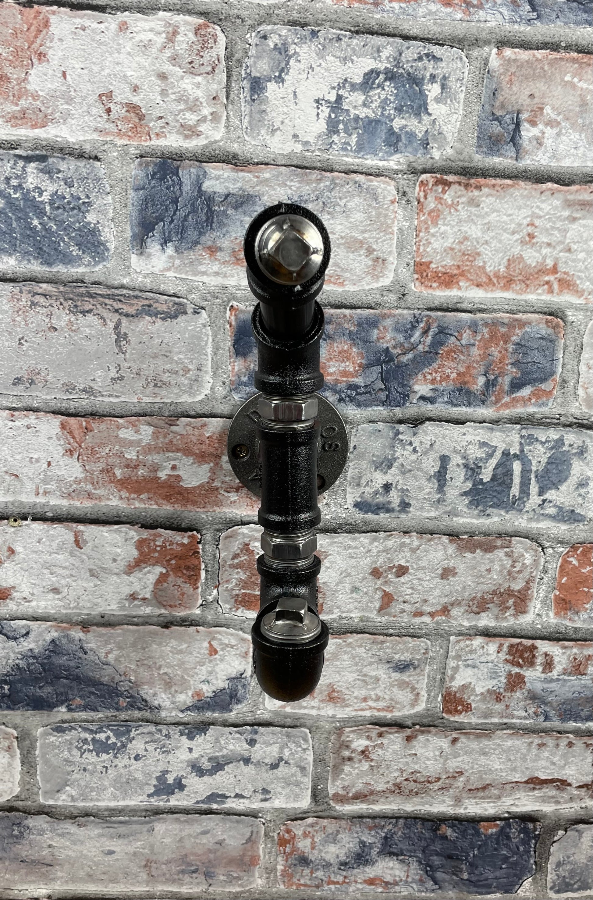 Industrial Style Metal Pipework Coat Hooks.

Chunky and super sturdy, these metal coat hooks come fully built and ready to attach to your wall.