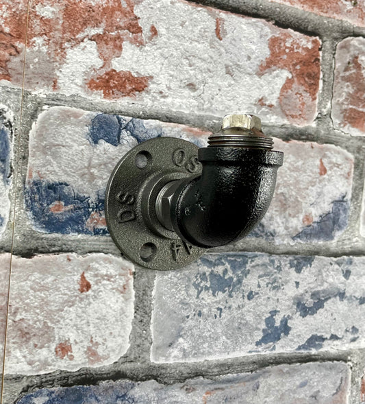 Industrial Style Metal Pipework Coat Hooks.

Chunky and super sturdy, these metal coat hooks come fully built and ready to attach to your wall.