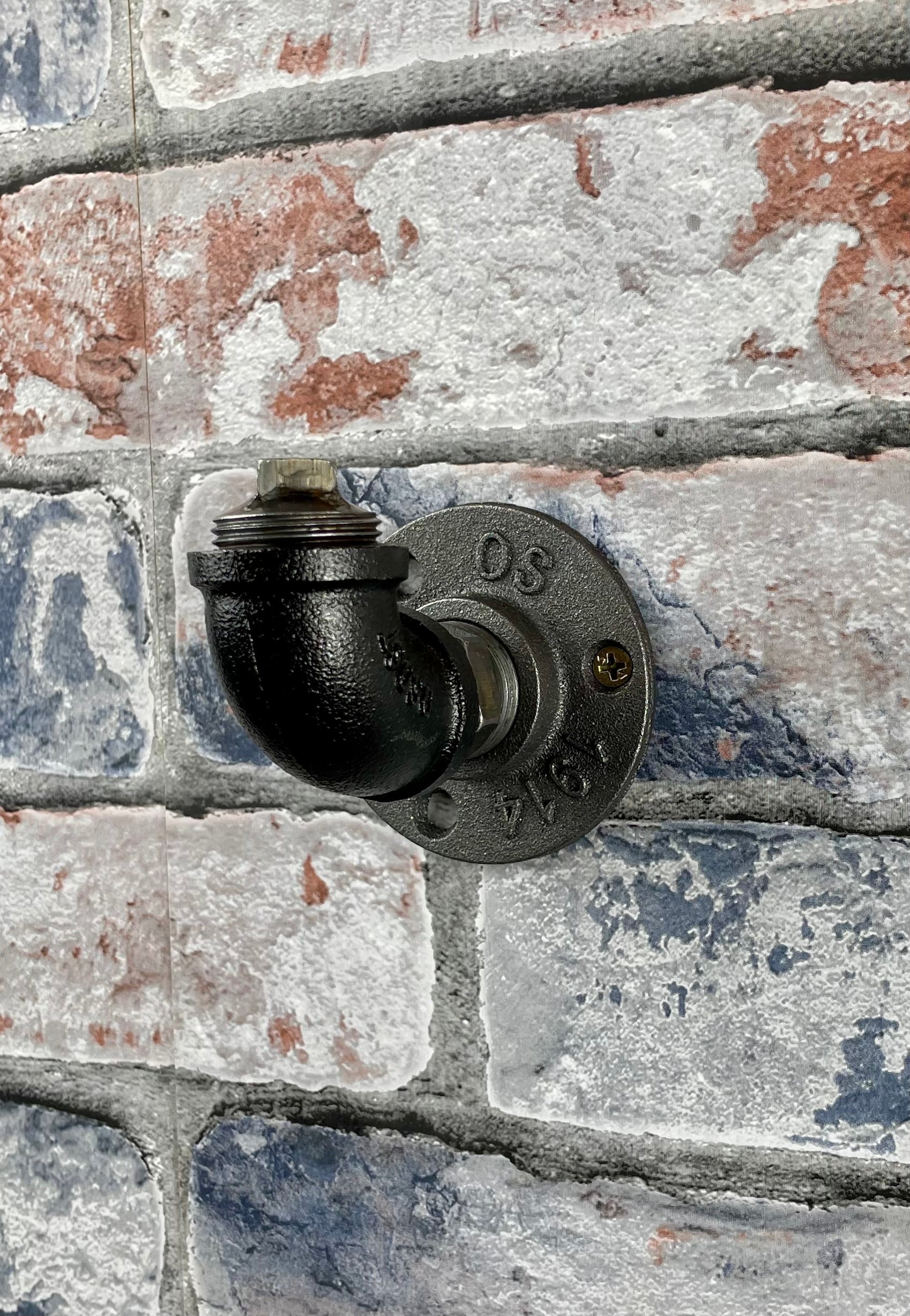 Industrial Style Metal Pipework Coat Hooks.

Chunky and super sturdy, these metal coat hooks come fully built and ready to attach to your wall.