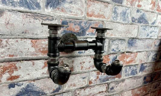 Industrial Style Metal Pipework Coat Hooks Set

Chunky and super sturdy, these metal coat hook sets come fully built and ready to attach to your wall. Perfect from coats, scarves, hats, keys and more.